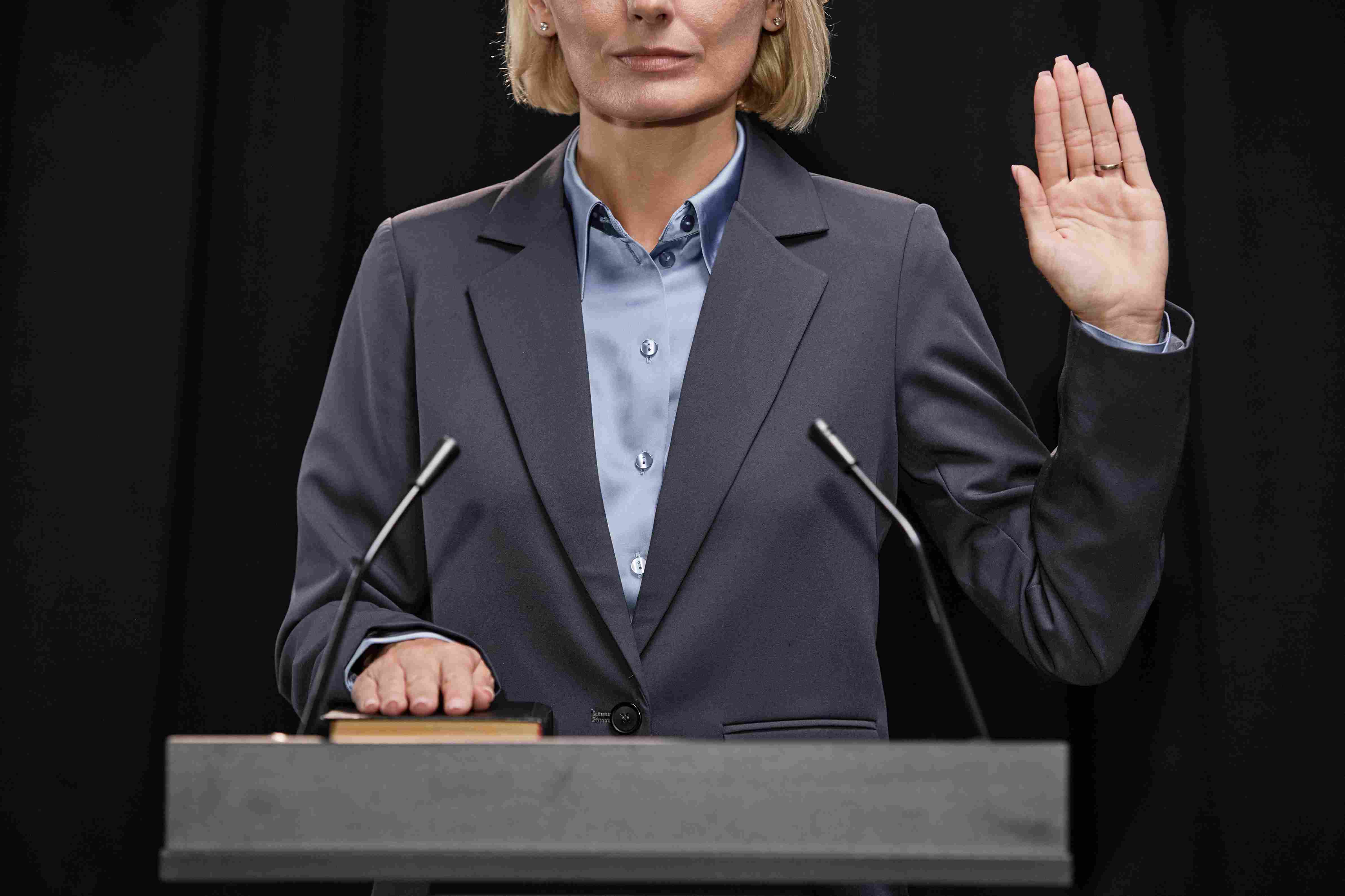 A lady taking oath in court